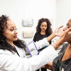 Lakeview Dermatology - Our Jang Mi Johnson, PA-C discussing Kybella treatment with patient at Lakeview Dermatology Hyde Park location.