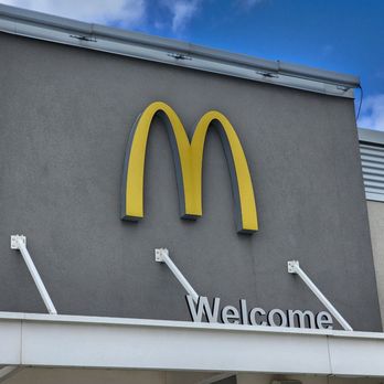 McDonald's - a mcdonald's logo on the side of a building - Burgers Near Me - Gilman, Illinois
