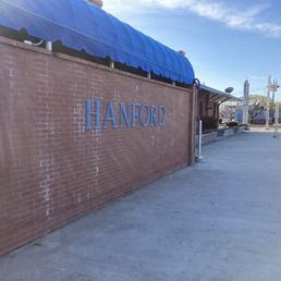 Signage on the wall of Hanford Amtrak Station Signage on the wall of Hanford Amtrak Station