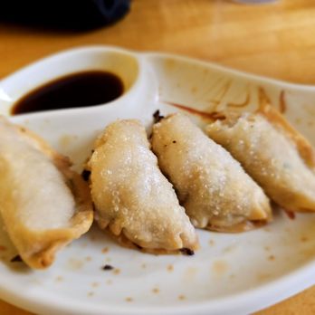 Nishi Moncho Ramen - three dumplings on a plate - Ramen Near Me - Honolulu, Hawaii Nishi Moncho Ramen - three dumplings on a plate - Ramen Near Me - Honolulu, Hawaii