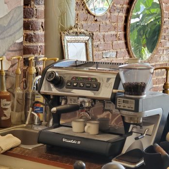 The Well - a coffee machine on a counter - Tea Rooms Near Me - Opelika, Alabama The Well - a coffee machine on a counter - Tea Rooms Near Me - Opelika, Alabama