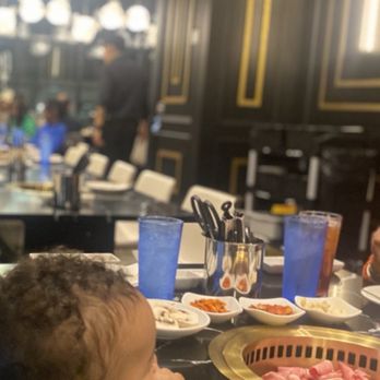 Thrill Korean Steak and Bar - My youngest enjoying the views while practicing to hold chopsticks - Korean Near Me - Buford, Georgia Thrill Korean Steak and Bar - My youngest enjoying the views while practicing to hold chopsticks - Korean Near Me - Buford, Georgia