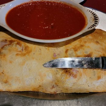 Rosa's Italian Restaurant - Medium calzone is huge!!! - Italian Near Me - Visalia, California Rosa's Italian Restaurant - Medium calzone is huge!!! - Italian Near Me - Visalia, California