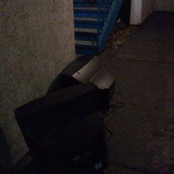 Travelodge by Wyndham Adrian - Old TV sets in walkway, back of the building. - Hotels Near Me - Adrian, Michigan Travelodge by Wyndham Adrian - Old TV sets in walkway, back of the building. - Hotels Near Me - Adrian, Michigan