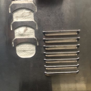 L.A Muffler & Catalytic - Heat screen patches between shield and catalytic converter to prevent rattling noise. - Auto Repair Near Me - Reseda, California L.A Muffler & Catalytic - Heat screen patches between shield and catalytic converter to prevent rattling noise. - Auto Repair Near Me - Reseda, California
