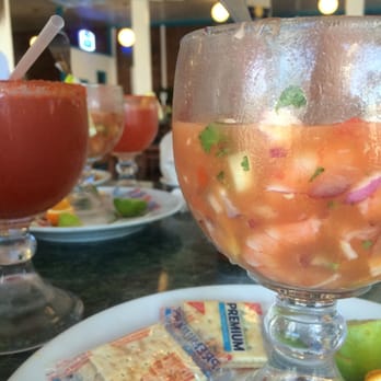 Mariscos Los Buchones - Shrimp cocktail and a michelada - Seafood Near Me - Long Beach, California