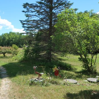 Ellison Bay Pottery Studios - Some artwork on the open grounds here. - Art Galleries Near Me - Ellison Bay, Wisconsin Ellison Bay Pottery Studios - Some artwork on the open grounds here. - Art Galleries Near Me - Ellison Bay, Wisconsin