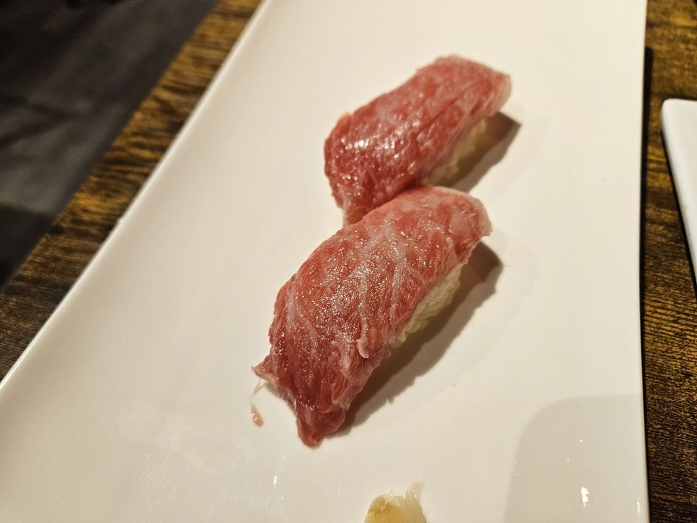 Ume Sushi and Poke Logo