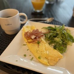 Lilly Valley Inn - Omelette Suffle topped with prosciutto and a side salad