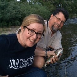 Fly Fishing School Santa Fe - Caught a rainbow trout with David Lemke's help. Looks like I'm trying to squeeze it to death! But it was gently released.
