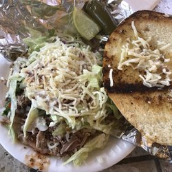 Carniceria La Rosita - Carnitas torta with everything, lime & jalapeños on the side