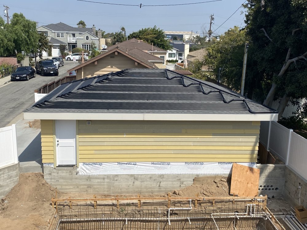 Slide of Pool Solar and Roofing