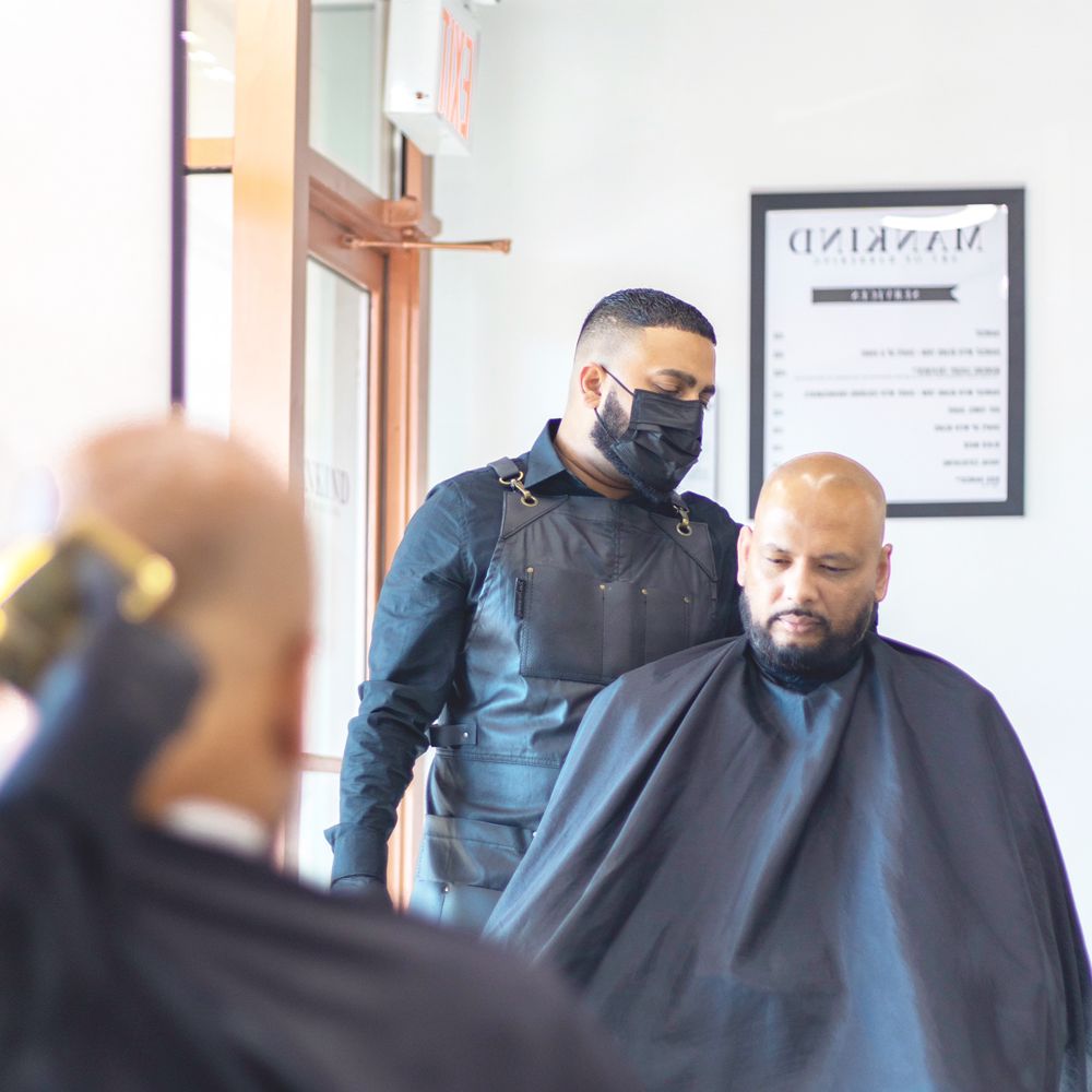 Mankind Art of Barbering Logo