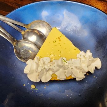 Crab Trap - a piece of cheesecake on a blue plate - Seafood Near Me - St. Simons, Georgia