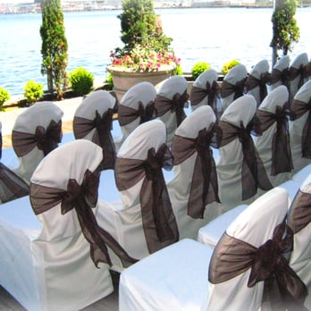 Seattle's Best Chair Covers - SBCC set up for an outdoor ceremony at Salty's on Alki - Party Supplies Near Me Seattle's Best Chair Covers - SBCC set up for an outdoor ceremony at Salty's on Alki - Party Supplies Near Me