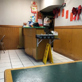 New Great Wok - a restaurant counter with a sign in front of it - Chinese Near Me - Middlesex, New Jersey New Great Wok - a restaurant counter with a sign in front of it - Chinese Near Me - Middlesex, New Jersey