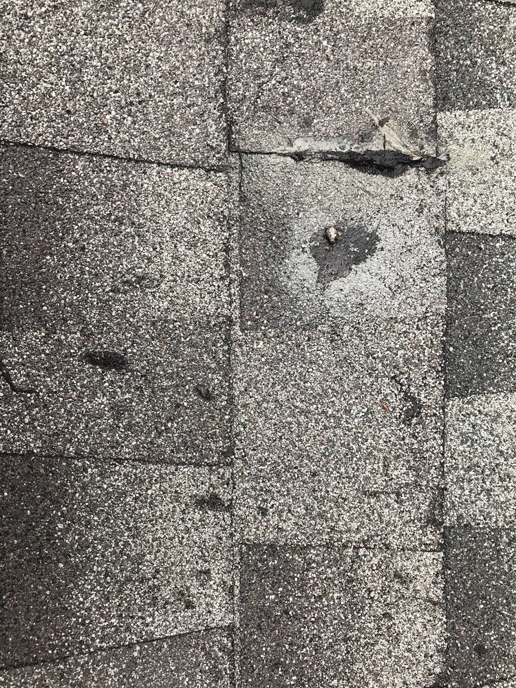 Slide of Mackel Roofing Company