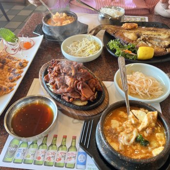 ABC Tofu House - My spicy pork bulgogi combo with dumpling soon tofu and mom's Alta mackerel combo with seafood soon tofu - Korean Near Me - Reseda, California