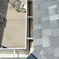 Moose Roofing - One of the low spots in the gutter which collects water and when it gets cold it freezes