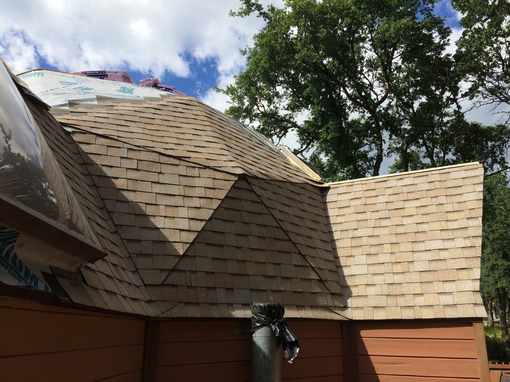 Slide of Mountain Roofing Systems