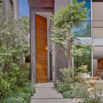 Alpine Door and Trim - Modern front door with oversized windows installed on a Pitzer Construction Company project. - Building Supplies Near Me - Gardena, California