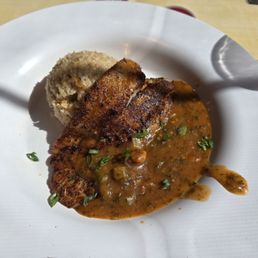 Blackened grouper with crawfish etouffee over smoked gouda grits WOW