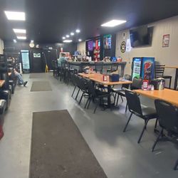 De Carne Somos grill - Seating and bar