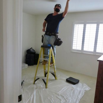 Ehret Electric - Starting to measure for the ceilng light. - Electricians Near Me