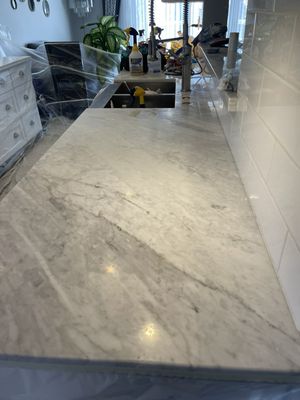 we specialize in marble,Quartz travertin all natural stone and tile restoration - the countertop and tile were in bad shape and we restored it and made them looms bran new again