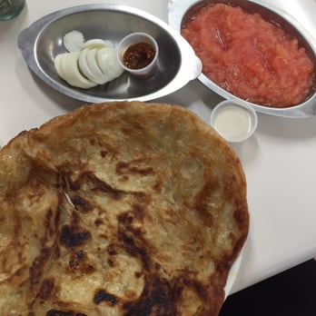 Geffen Gourmet - Mehlawa fresh from the frying pan served with boiled egg, puréed tomato, harif and tahini. - Grocery Near Me - Hewlett, New York Geffen Gourmet - Mehlawa fresh from the frying pan served with boiled egg, puréed tomato, harif and tahini. - Grocery Near Me - Hewlett, New York