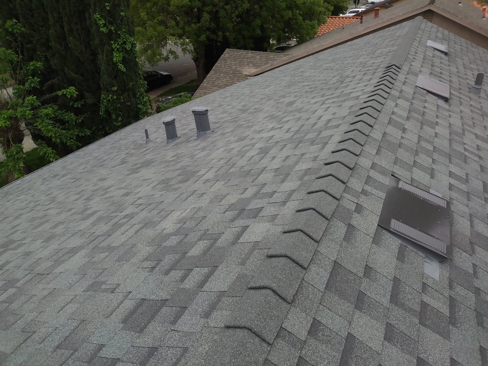 Slide of NL Roofing
