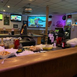 a bar with food on the counter a bar with food on the counter