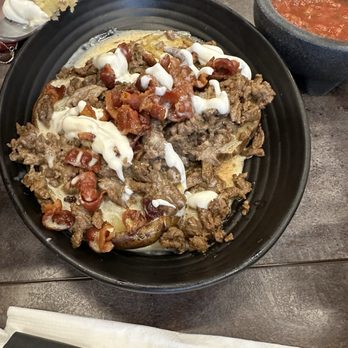 Casa Alejo - Baked potato w bacon and steak bites sour cream and melted cheese - New Mexican Cuisine Near Me - Springdale, Arkansas Casa Alejo - Baked potato w bacon and steak bites sour cream and melted cheese - New Mexican Cuisine Near Me - Springdale, Arkansas
