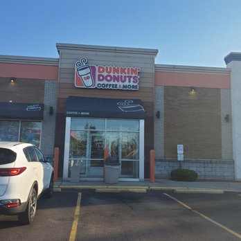 Dunkin' - a car parked in front of a dunkin donuts coffee shop - Donuts Near Me - Warrensville Heights, Ohio Dunkin' - a car parked in front of a dunkin donuts coffee shop - Donuts Near Me - Warrensville Heights, Ohio