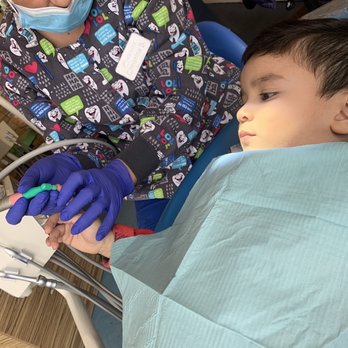 Children's Choice Dental Care - Oxnard - Christina taking the time to explain the tools she's been using and what they do.. - Pediatric Dentists Near Me - Oxnard, California