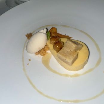 Le Papillon - Mango dessert with house made vanilla ice cream which was amazing, candied macadamia nuts - French Near Me - San Jose, California