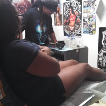 Beyond Reality - Shunda B's first ink!  She is smiling through the pain. lol - Tattoo Near Me - Wyandotte, Michigan