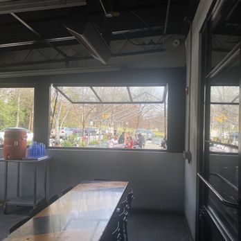 Victory Sandwich Bar - Interior seating looking out to patio seating area - American Near Me - Atlanta, Georgia Victory Sandwich Bar - Interior seating looking out to patio seating area - American Near Me - Atlanta, Georgia