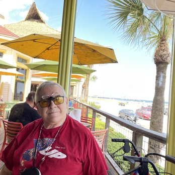 The Spot - View from the inside A/C portion of the restaurant. - Burgers Near Me - Galveston, Texas The Spot - View from the inside A/C portion of the restaurant. - Burgers Near Me - Galveston, Texas