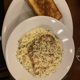 Pasta in White Wine Cream Sauce with grilled chicken. Pasta in White Wine Cream Sauce with grilled chicken.