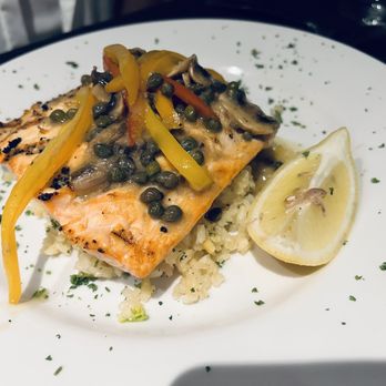 Buzzetta’s Italian Cafe - Grilled Salmon Special with capers over Risotto - Italian Near Me - Chesterfield, Missouri Buzzetta’s Italian Cafe - Grilled Salmon Special with capers over Risotto - Italian Near Me - Chesterfield, Missouri