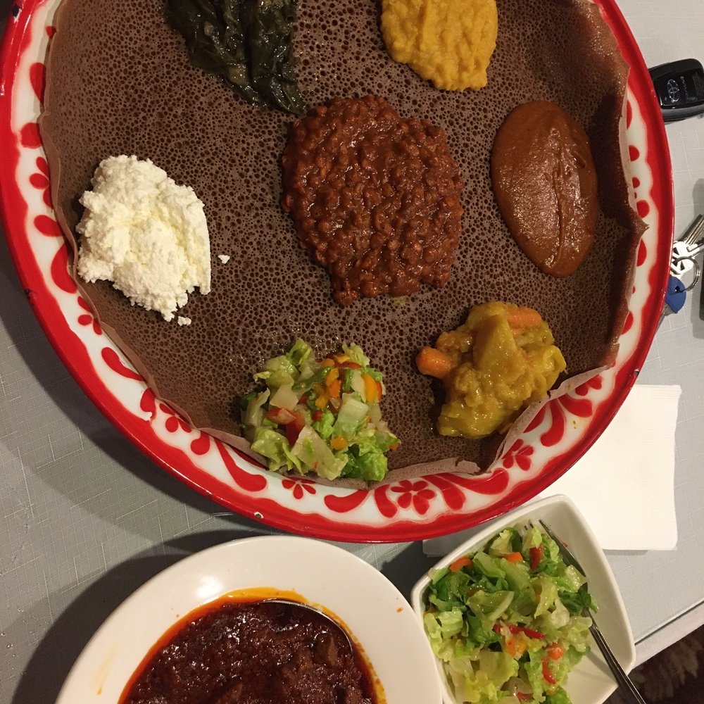 Meskel Ethiopian Restaurant - Vegetarian Combination + beef dish on gluten-free injeera - Ethiopian Near Me - Seattle, Washington Meskel Ethiopian Restaurant - Vegetarian Combination + beef dish on gluten-free injeera - Ethiopian Near Me - Seattle, Washington