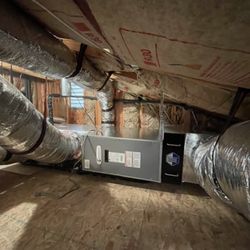 Earth Air Systems - Heat pump air handler with a hepa filter cabinet and new ductwork.