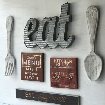 Cravings - a wall with a variety of signs and utensils - Sandwiches Near Me - Milledgeville, Georgia