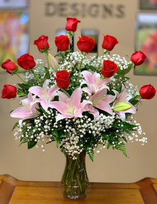 Always On My Mind - Premium long stems roses and stargazer lilies are perfectly arrive in a glass vase with filler and greens. Always On My Mind - Premium long stems roses and stargazer lilies are perfectly arrive in a glass vase with filler and greens.