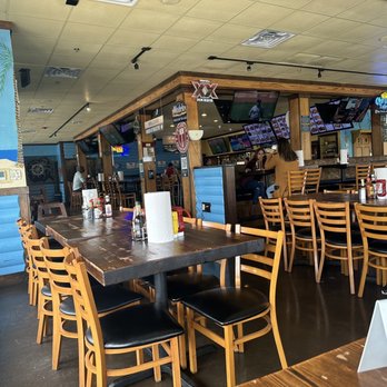 Super Shack - tables and chairs in a restaurant - Seafood Near Me - McKinney, Texas Super Shack - tables and chairs in a restaurant - Seafood Near Me - McKinney, Texas