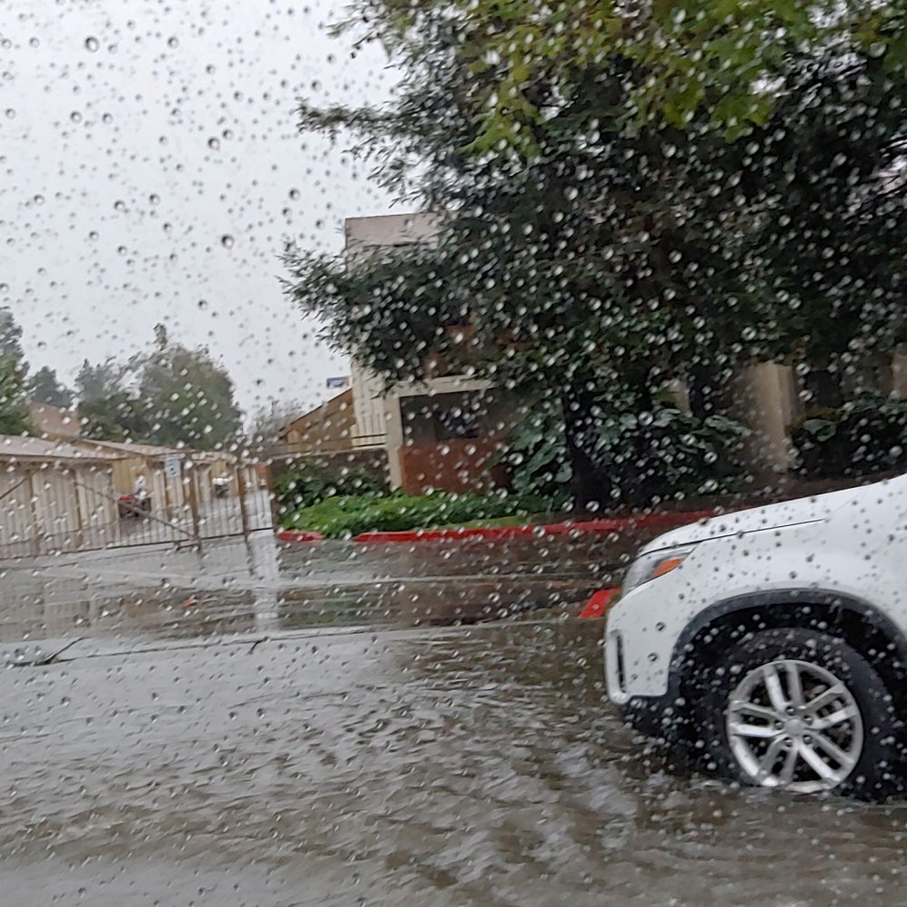 Fern Apartments - Flooded street on Fern Ave during heavy rain - Apartments Near Me - Ontario, California Fern Apartments - Flooded street on Fern Ave during heavy rain - Apartments Near Me - Ontario, California