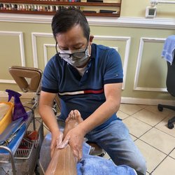 Custom Nails - Henry giving the best pedicure of my life.... I needed that!!!!