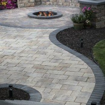 Total Renovation Landscaping - a patio with a fire pit - Masonry/Concrete Near Me Total Renovation Landscaping - a patio with a fire pit - Masonry/Concrete Near Me