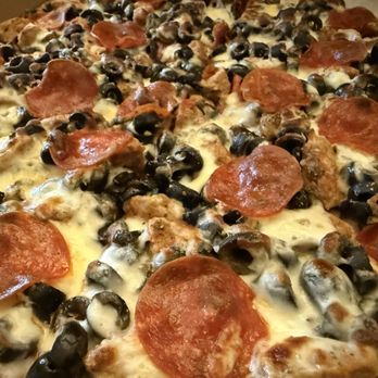 Cousin Vinnie's NY Pizza Cafe - Olive, mushrooms, pepperoni, sausage. - Pizza Near Me - Friday Harbor, Washington